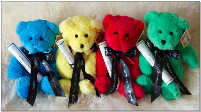 Picture of coloured Teddy Bears wearing Connections Matter ribbons to help stamp out stigma. 