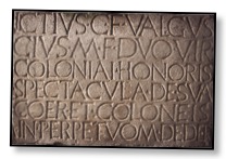 Picture of a clay tablet with Latin text to communicate a message